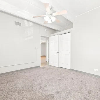 Julian Square Apartments bedroom with ceiling fan